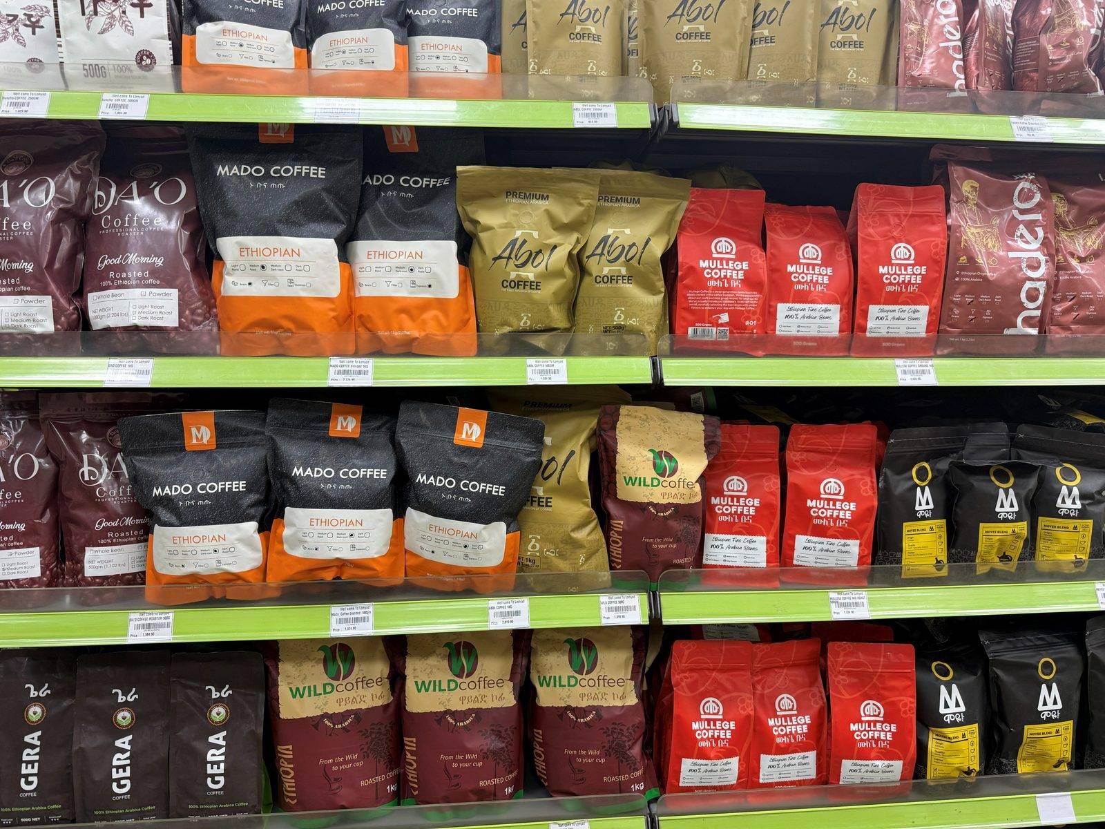 Bags of Ethiopian coffee brands on a shop shelf