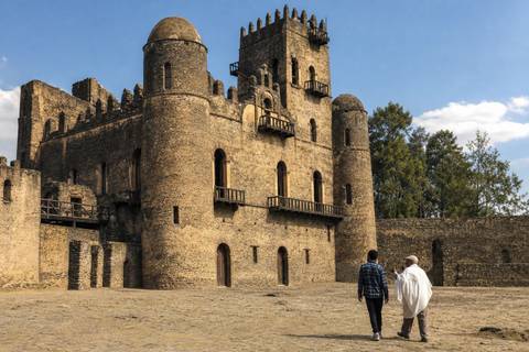 Fasilides Castle with round stone towers and arched openings inside Gondar's royal enclosure